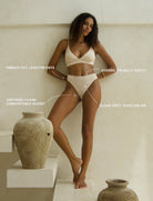Model wearing beige Elevate High-Rise Bikini