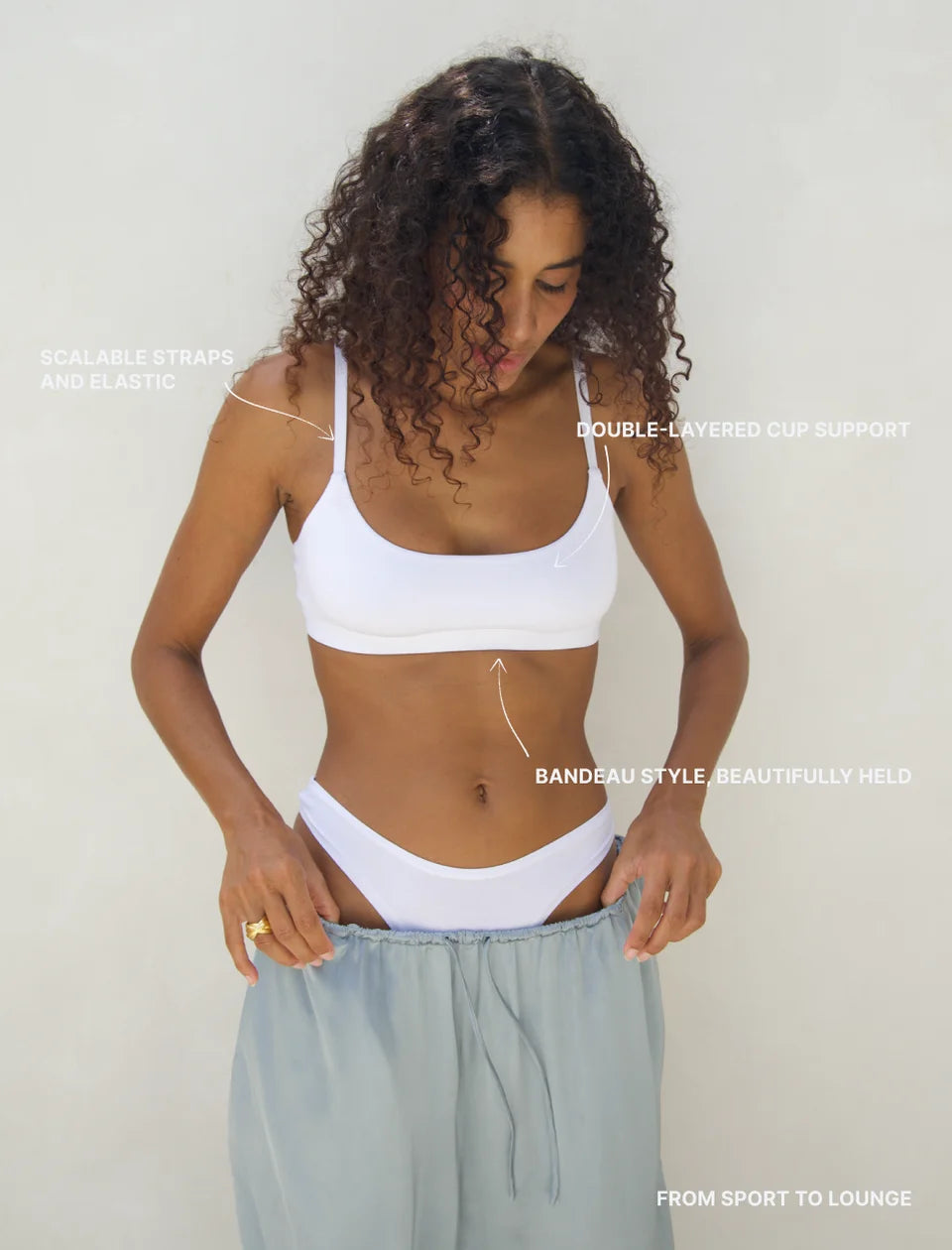 Model wearing white Support Bralette with white underwear